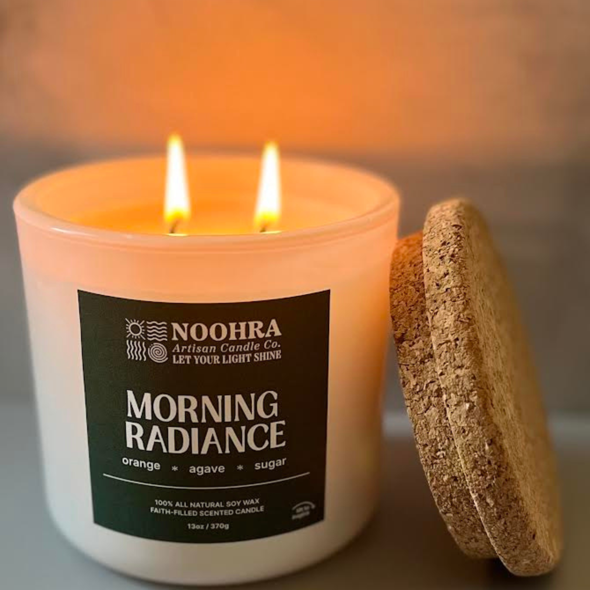 A soy candle that says morning radiance
