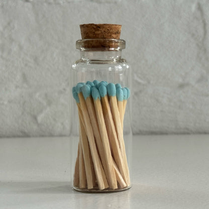 Match in a glass vial with cork - turqouise
