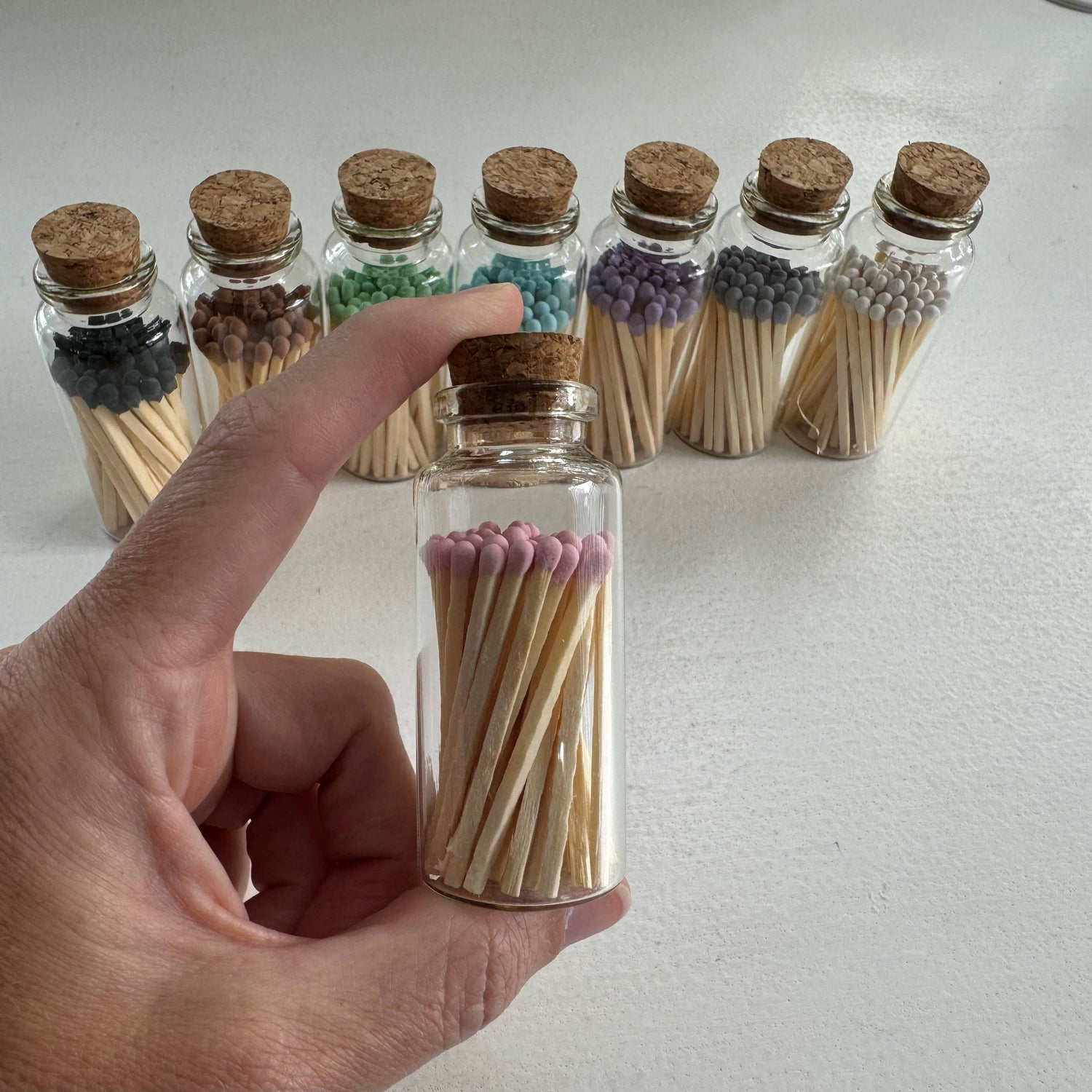 Match in a glass vial - pink